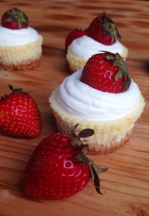 The lightest, fluffiest lemon cheesecake you will ever have. Topped with whip cream and a strawberry. - Chocolate with Grace