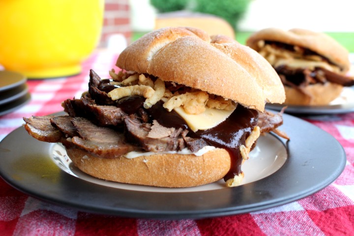 Smoked Barbecue Beef Brisket Sandwiches. These "smoked" barbecue beef brisket sandwiches are actually made in the slow cooker. Fork-tender, they are delicious topped with barbecue sauce, mayo, smoked Gouda cheese and crispy onion straws. My husband declared them one of the best sandwiches ever.