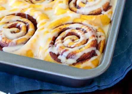 Pumpkin Cinnamon Rolls can be made with a traditional glaze or Nutella