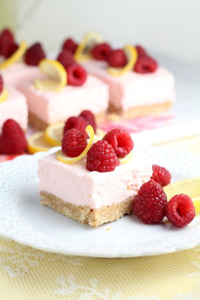 These Raspberry Lemon No Bake Cheesecake Bars require just 4 ingredients for the cheesecake layer that is chilled on a simple graham cracker crust. #PourMoreFun #ad