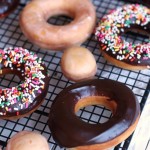 Homemade Fried Yeast Donuts with Vanilla or chocolate glaze and sprinkles of course. Because sprinkle donuts are the best!