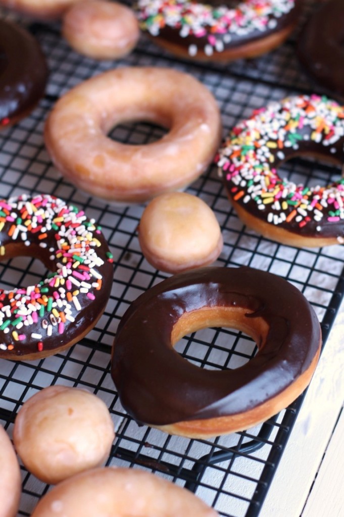 Homemade Fried Yeast Donuts with Vanilla or chocolate glaze and sprinkles of course. Because sprinkle donuts are the best!