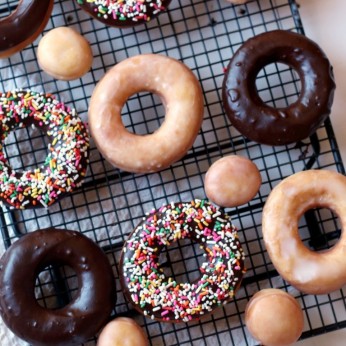 Homemade Fried Yeast Donuts with Vanilla or chocolate glaze and sprinkles of course. Because sprinkle donuts are the best!