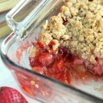 Strawberry Rhubarb Crisp is a quick and easy springtime dessert that is perfect for last minute guests. Fresh rhubarb and sweet strawberries topped with a crunchy oatmeal crumble make a dessert no one will forget. Top with whipped cream or vanilla ice cream.