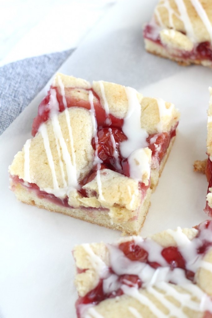 Easy cherry pie bar recipe from scratch. You can either use canned cherry pie filling or make your own with fresh cherries in this easy cherry dessert recipe. It is perfect for the 4th of July or summer picnics and BBQs.
