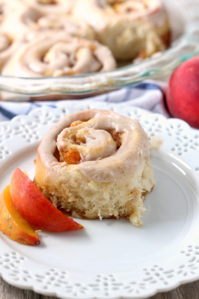 Brown Sugar Peach Sweet Rolls are a fun summer breakfast or brunch treat. A perfect summer fruit dessert recipe that can be frosted with either cream cheese or brown butter frosting. 