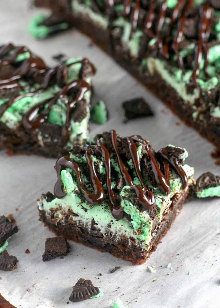 Mint Oreo Brownies with thick frosting and a fudge drizzle