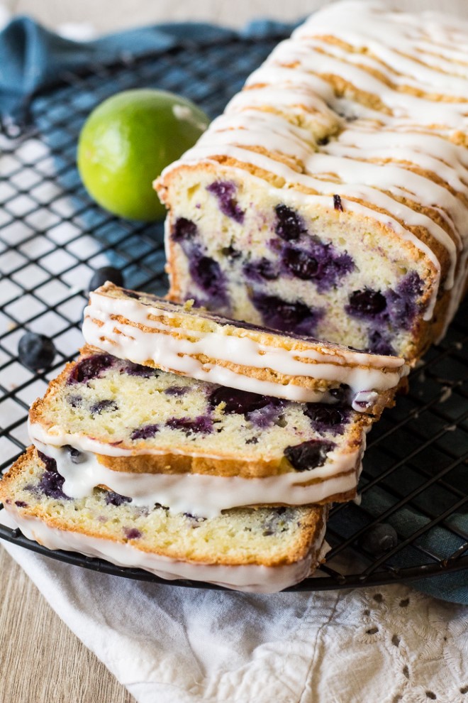 blueberry lime bread on a cooling rack. 