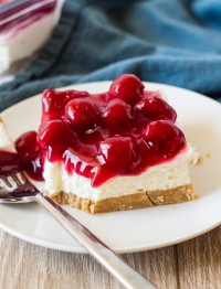 piece of no bake cherry cheesecake on a plate