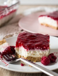 no bake raspberry cheesecake with a bite on a fork