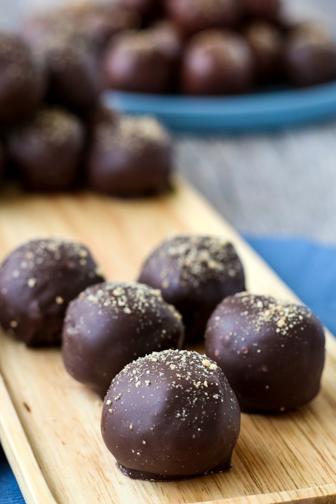 Close up shot of the peanut butter balls with graham crackers on top, finished and ready to enjoy.