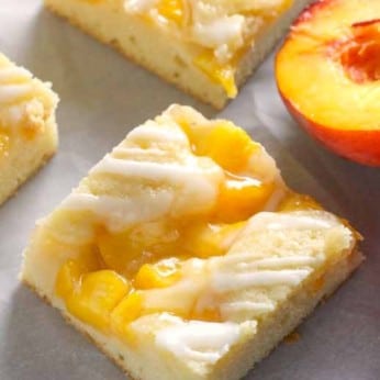 Fresh peaches are the secret to these mouthwatering pie bars!