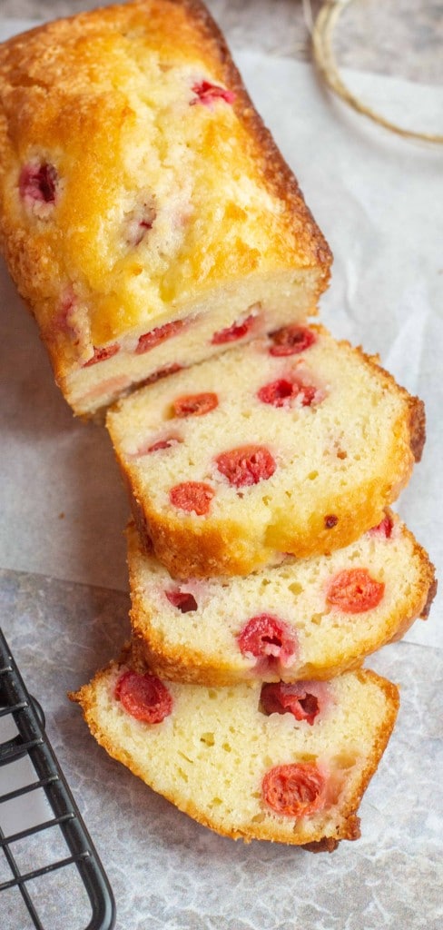 a top down photo of cherry sweet bread that has been sliced