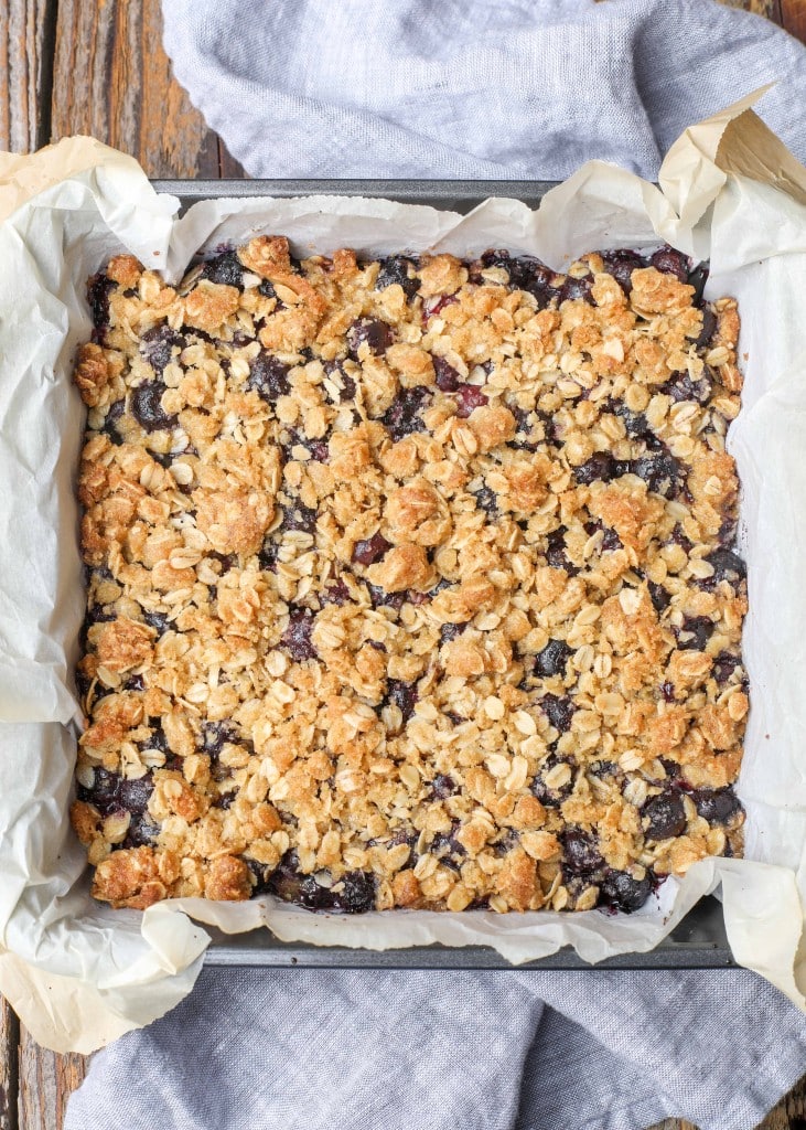 Baked Blueberry Crunch in pan with parchment