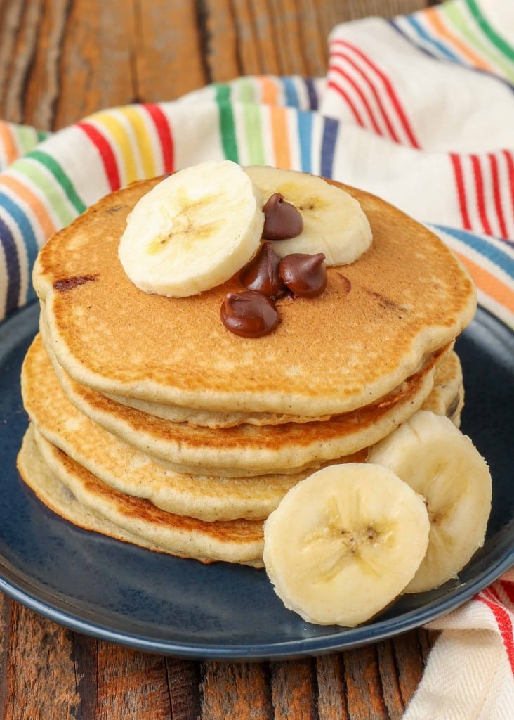 stack of pancakes with bananas and chocolate chips