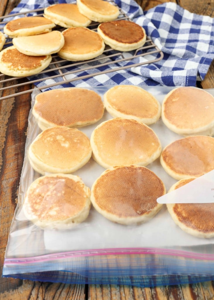 stacking pancakes in bag for freezing