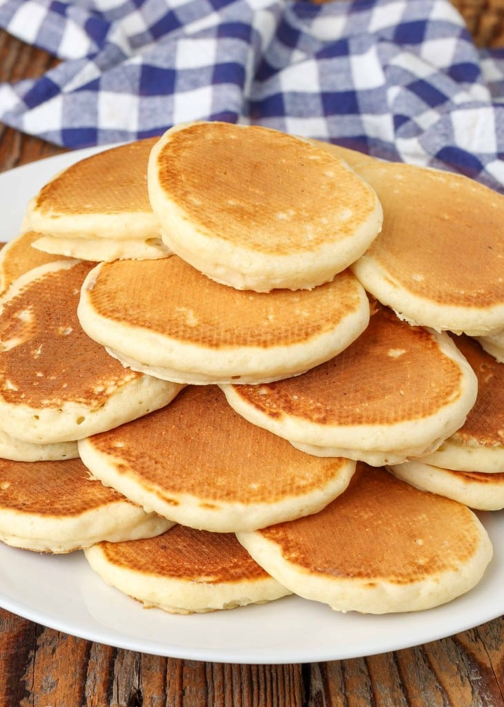 pile of mini pancakes on plate