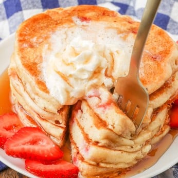 sliced pancake stack with wedges on fork