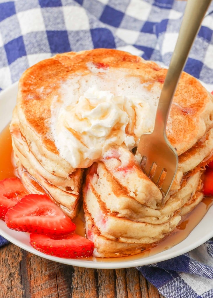 sliced pancake stack with wedges on fork