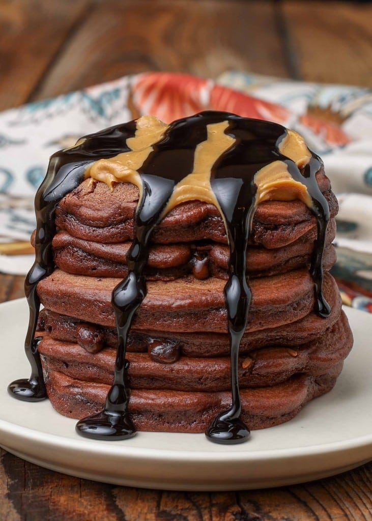 Chocolate pancakes with peanut butter and chocolate sauce