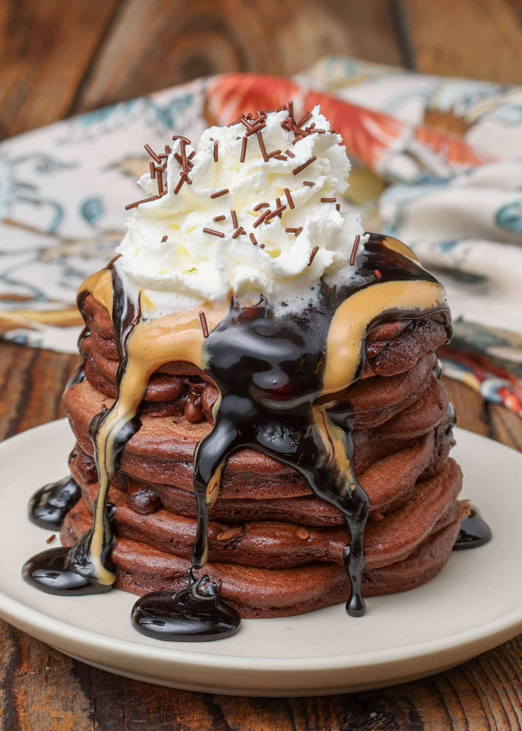 https://chocolatewithgrace.com/wp-content/uploads/2022/12/Chocolate-Pancakes-CWG-4-1-of-1-scaled.jpg