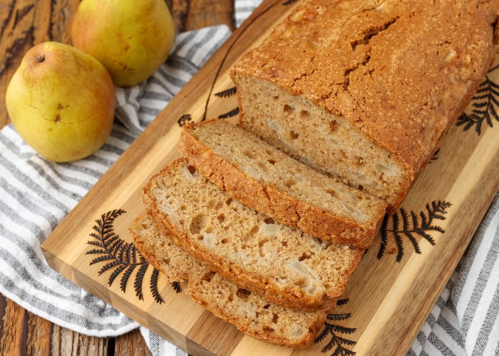 sliced bread with pears on cutting board