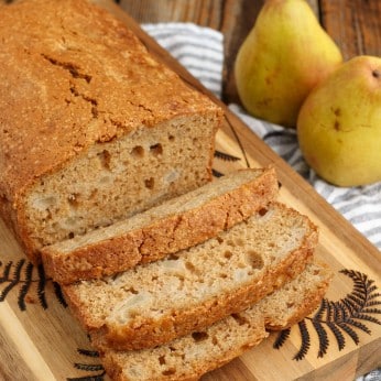 sliced bread with pears on cutting board