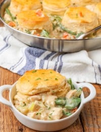 Chicken Pot Pie with Biscuits in white ramekin and pan