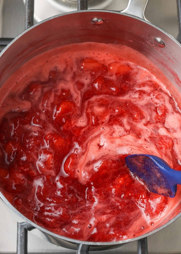 quartered strawberries in sauce pan