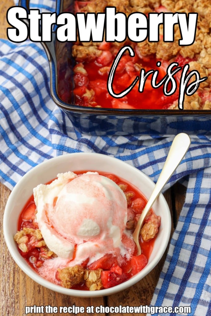 Strawberry Crisp topped with ice cream on a blue and white linen
