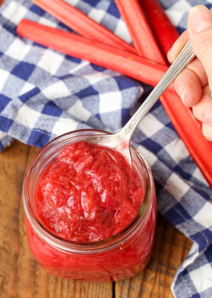 ice cream topping made from rhubarb in jar with spoon