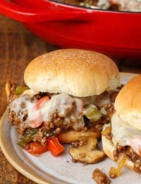 close up of cheesesteak slider on pottery plate