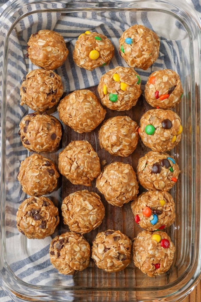 all of the balls have been formed with m&ms and chocolate chips visible