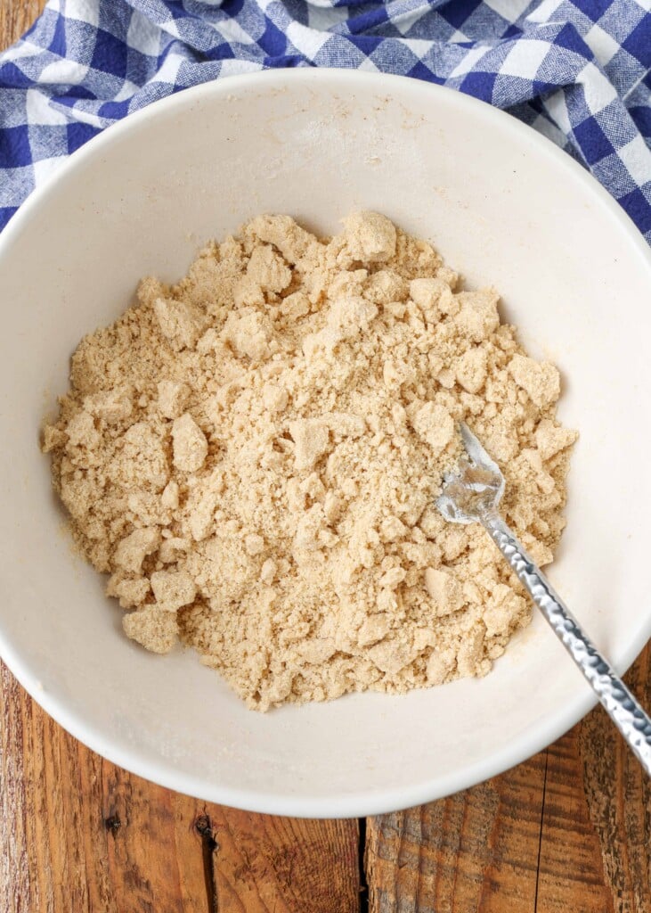 crisp topping made without oats in mixing bowl with fork