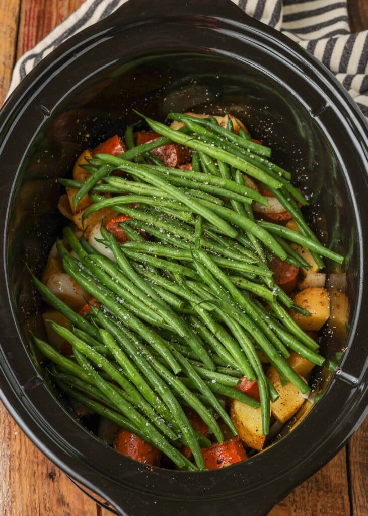Green beans layered into slow cooker