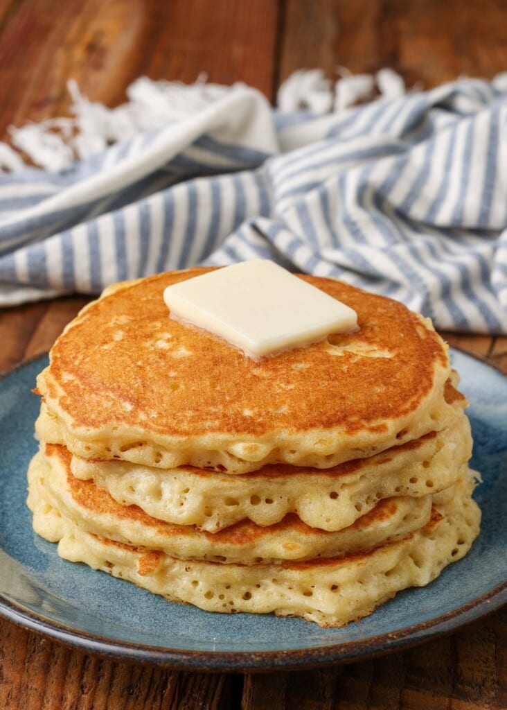 pat of butter on stack of pancakes