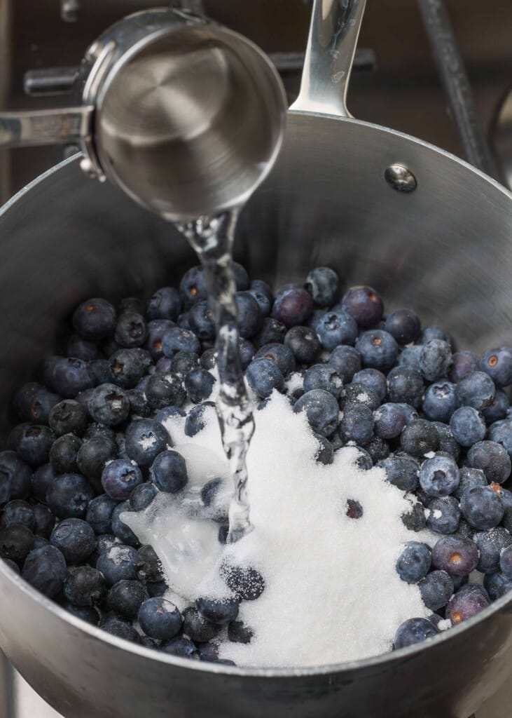 blueberries, sugar, and water in sauce pan