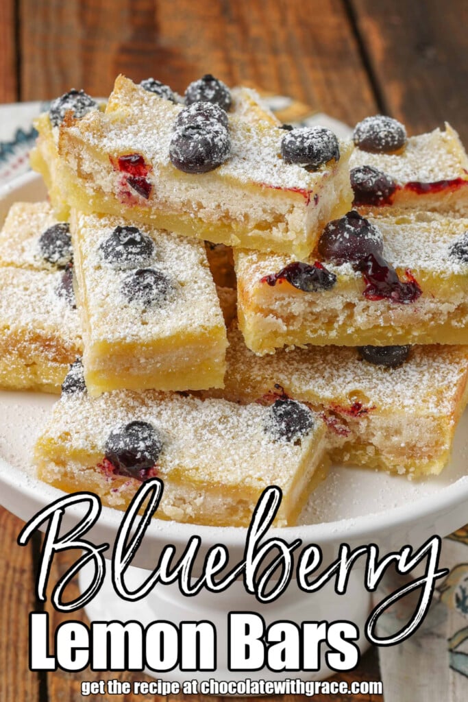 close up photo of lemon bars with blueberries on a shortbread crust