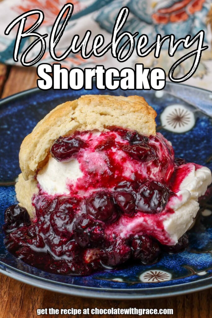 white lettering has been overlaid this image of blueberry shortcake on a blue plate. it reads, "blueberry shortcake"