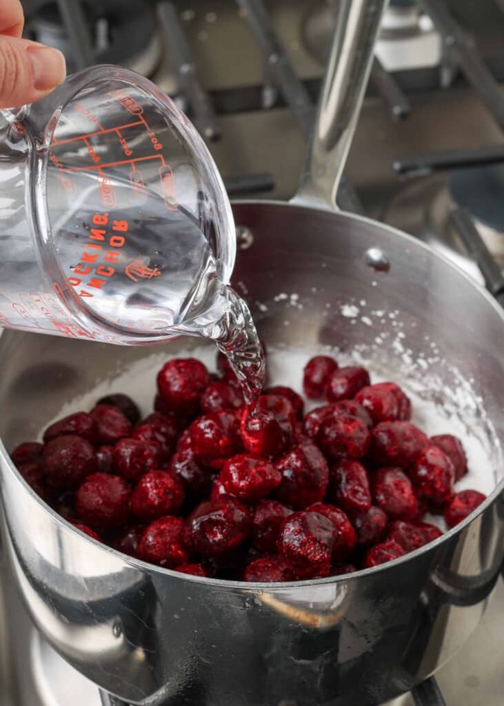 ingredients for cherry sauce in pan