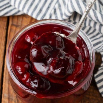 close up photo of cherry sauce in ladle