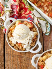 Apple Rhubarb Crisp in dishes with ice cream on top