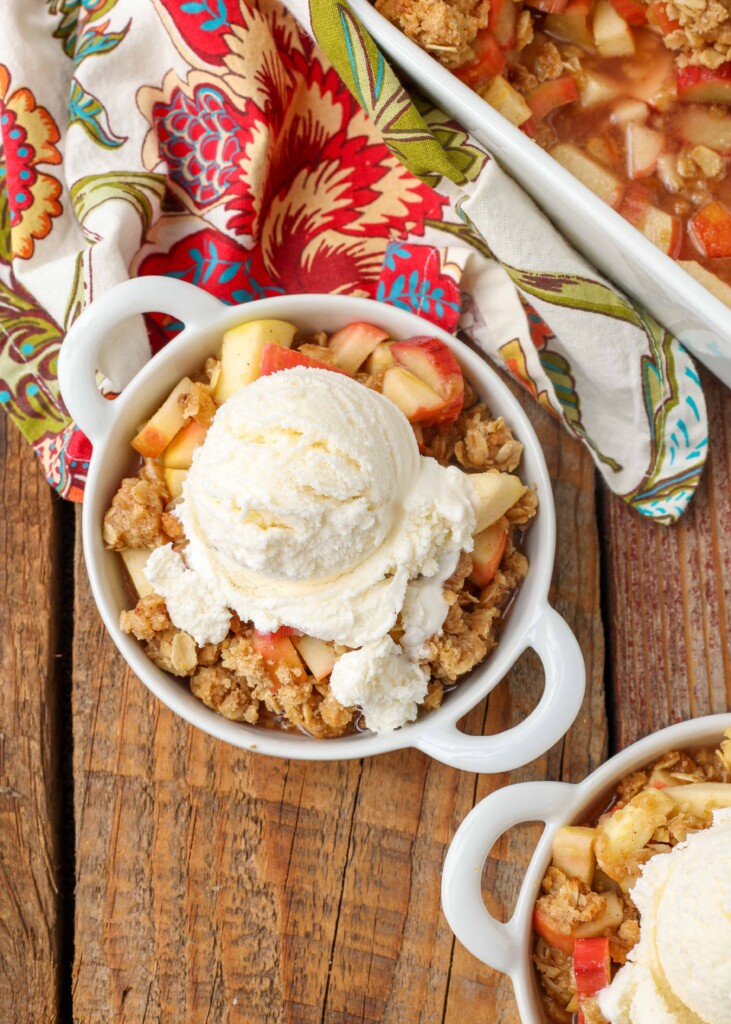 Apple Rhubarb Crisp in dishes with ice cream on top