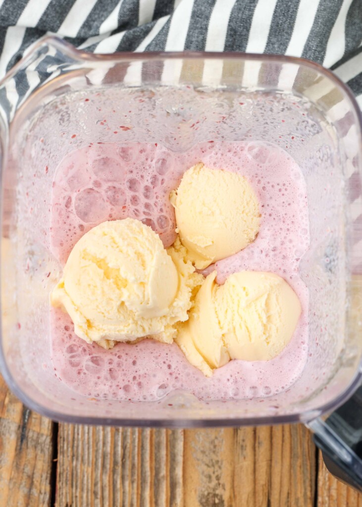 cherries, milk, and ice cream in the blender