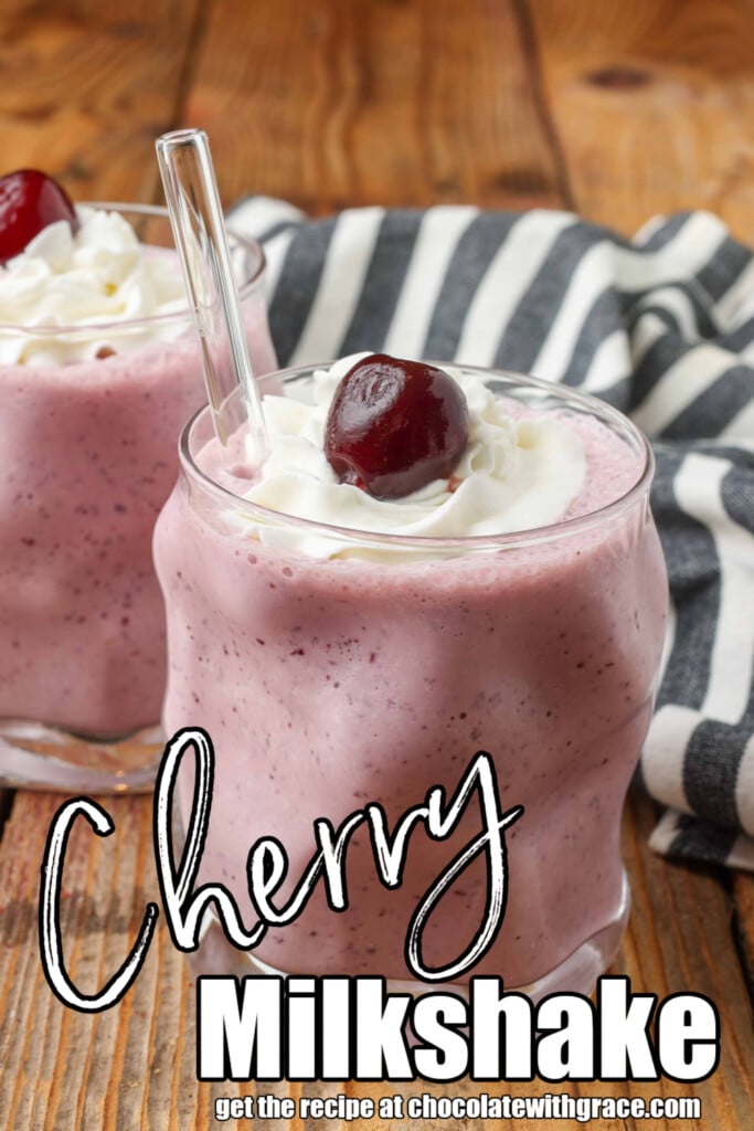 bright pink milkshakes in glasses with a cherry on top