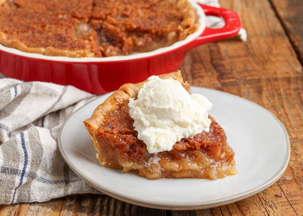 horizontal photo of pie with ice cream on top