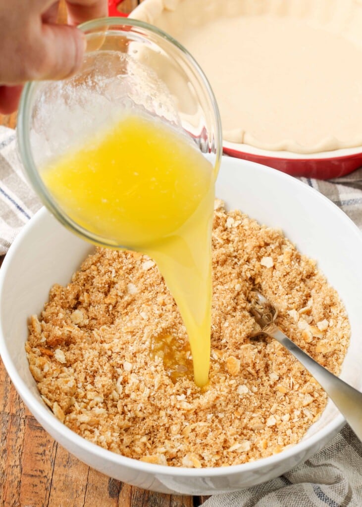 butter poured into streusel topping