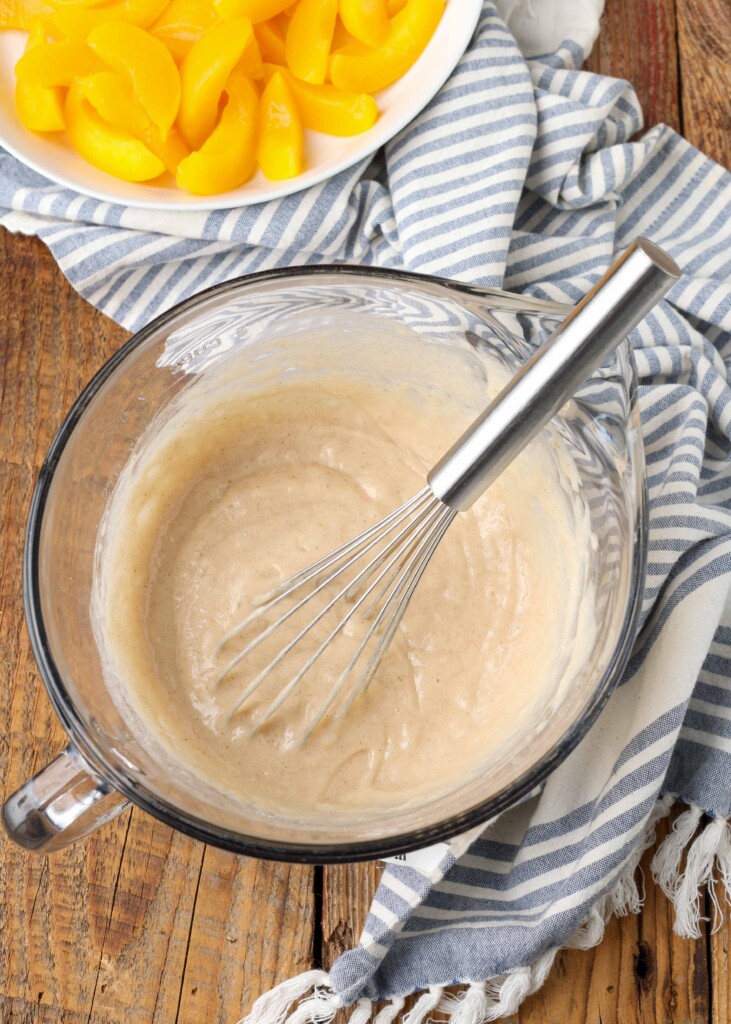 cobbler batter in bowl with whisk