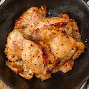 baked chicken in black bowl