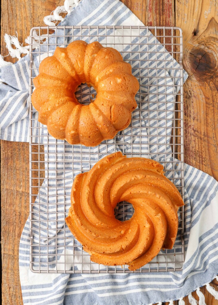 pound cakes made with cream cheese on cooling racks